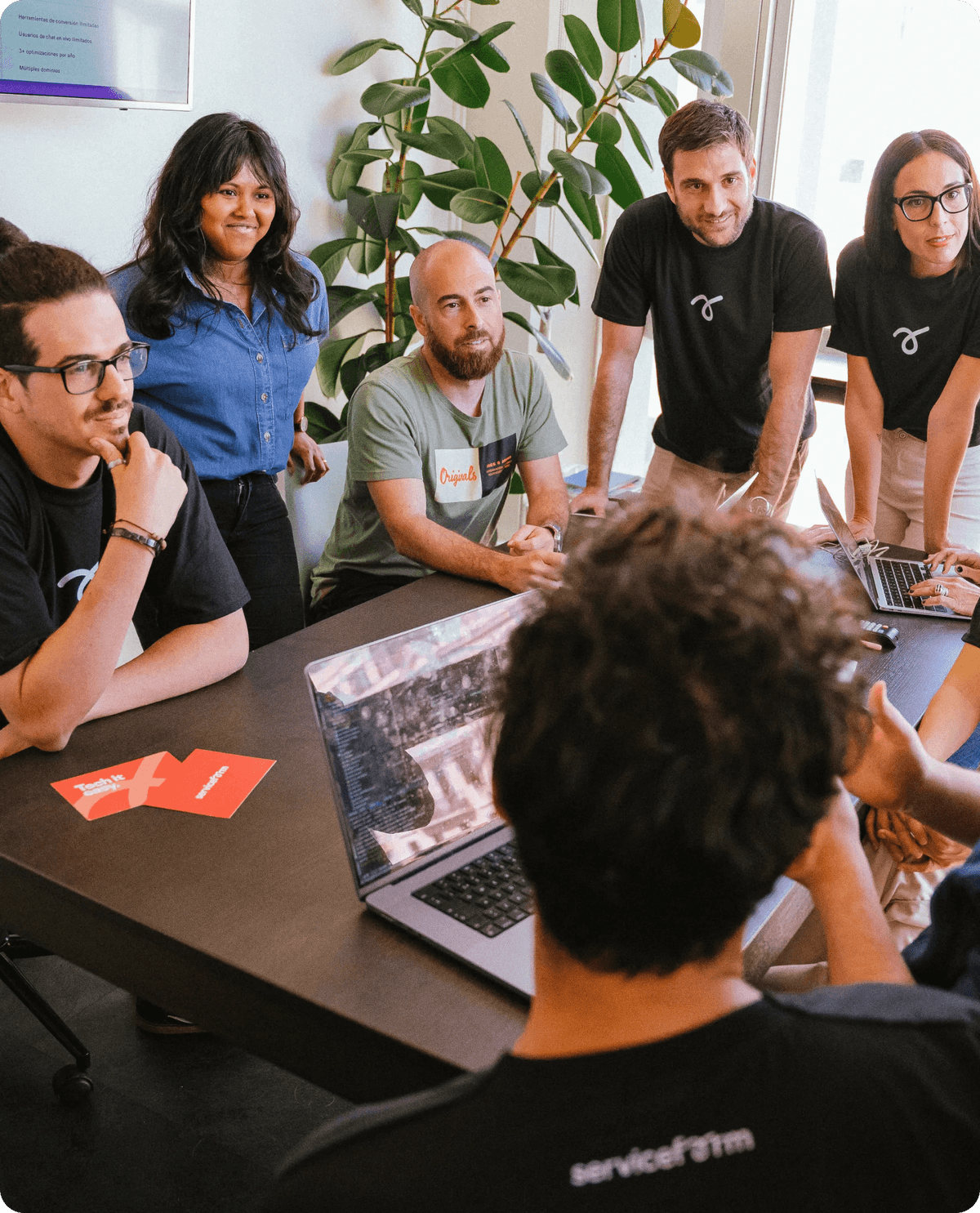 Serviceform team collaborating in an office